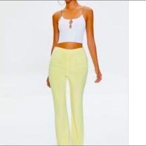 Never worn, yellow ruched pants